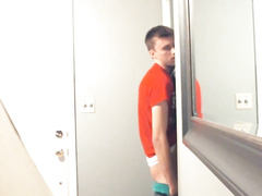 Solo action in the public bathroom with a horny boy